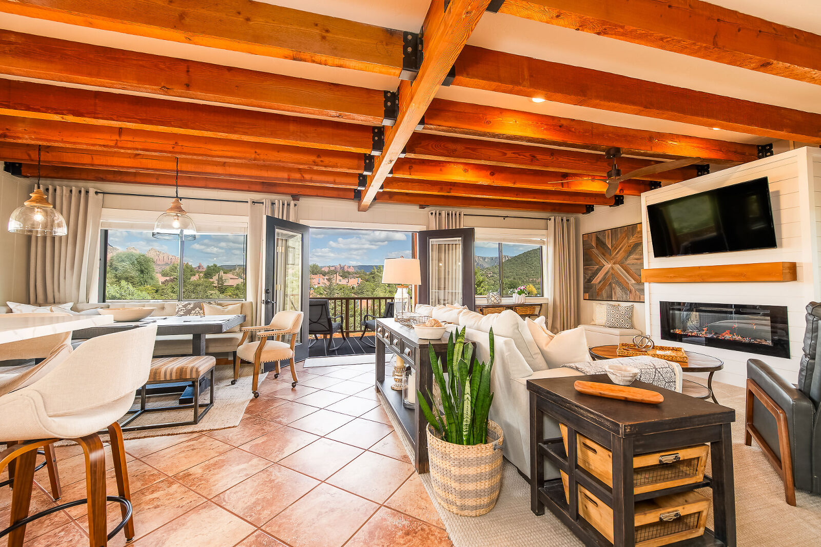 Open-concept kitchen and dining area in Sedona real estate listing